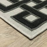 3' X 5' Beige and Black Stain Resistant Indoor Outdoor Area Rug