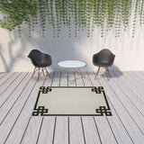 5' X 7' Beige and Black Stain Resistant Indoor Outdoor Area Rug