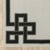 5' X 7' Beige and Black Stain Resistant Indoor Outdoor Area Rug