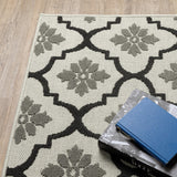 2' X 4' Beige and Black Geometric Stain Resistant Indoor Outdoor Area Rug