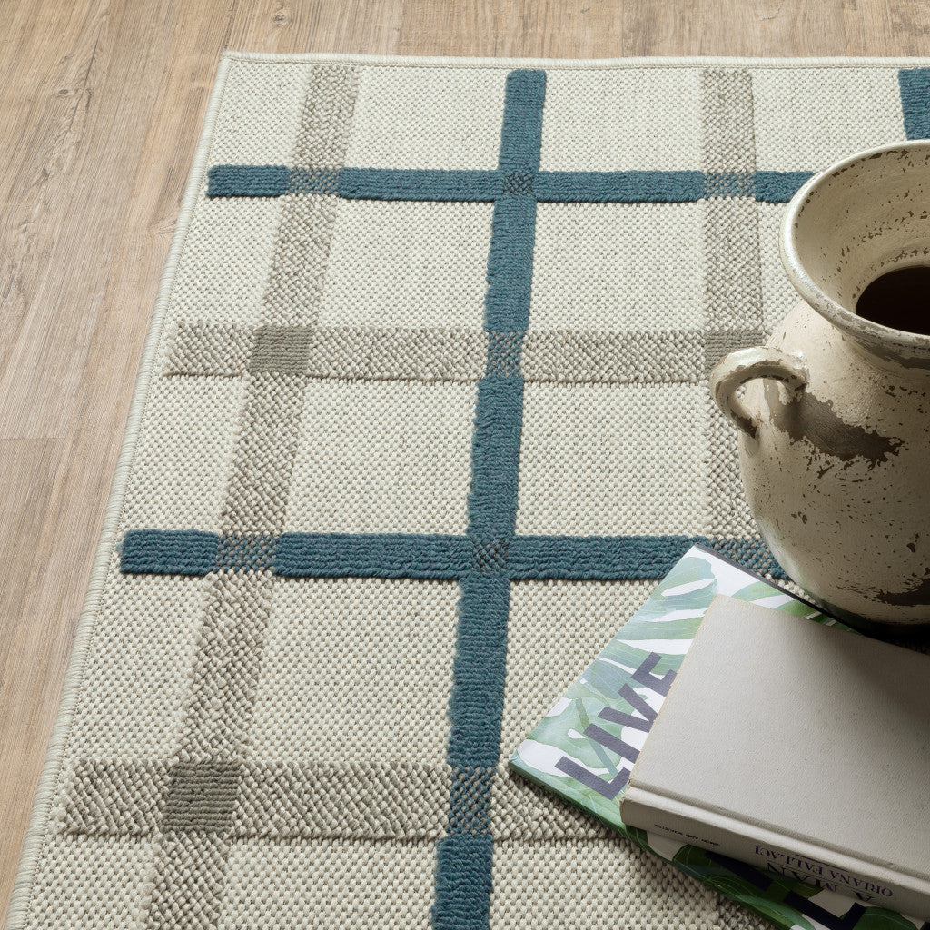 2' X 4' Blue and Beige Geometric Stain Resistant Indoor Outdoor Area Rug