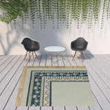 7' X 9' Blue and Beige Stain Resistant Indoor Outdoor Area Rug