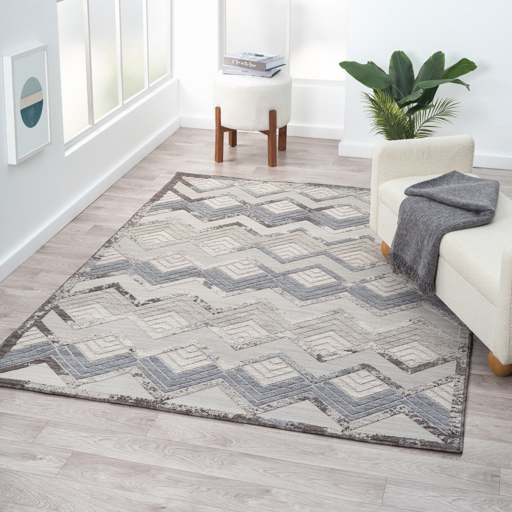 8' X 9' Blue And Ivory Chevron Indoor Outdoor Area Rug