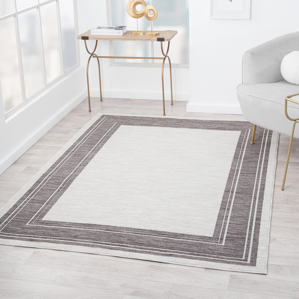 5' X 7' Gray And Ivory Indoor Outdoor Area Rug