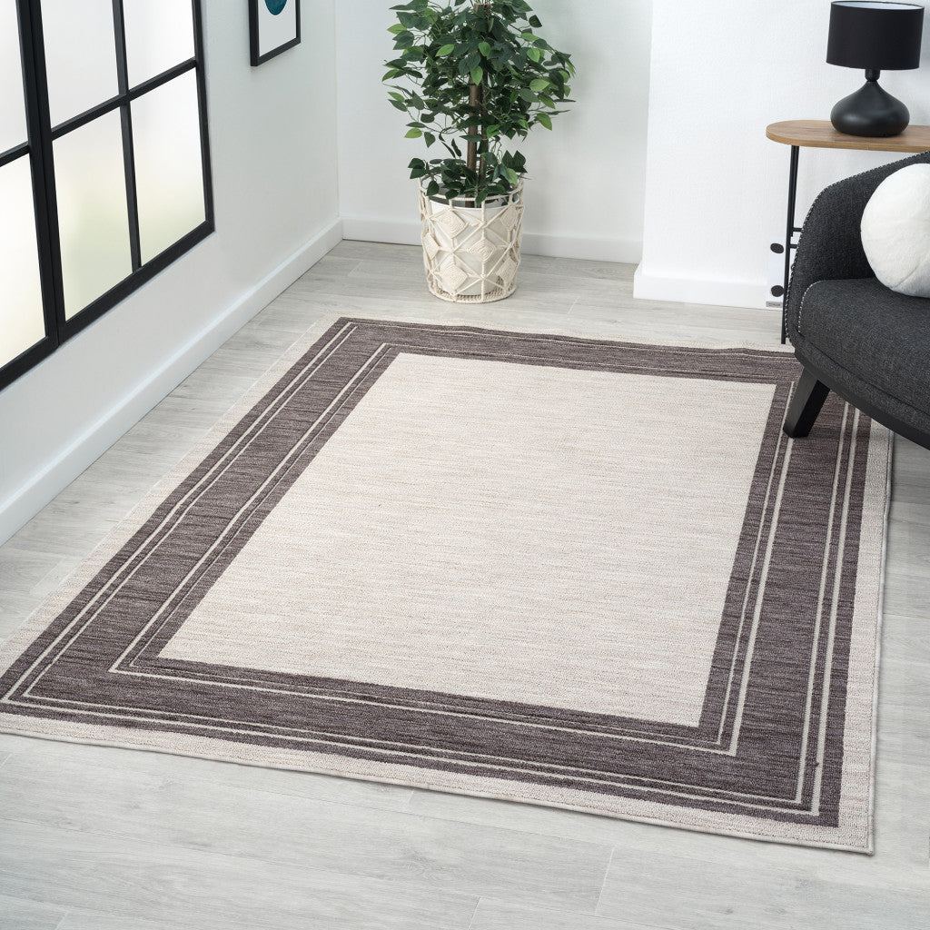 5' X 7' Gray And Ivory Indoor Outdoor Area Rug