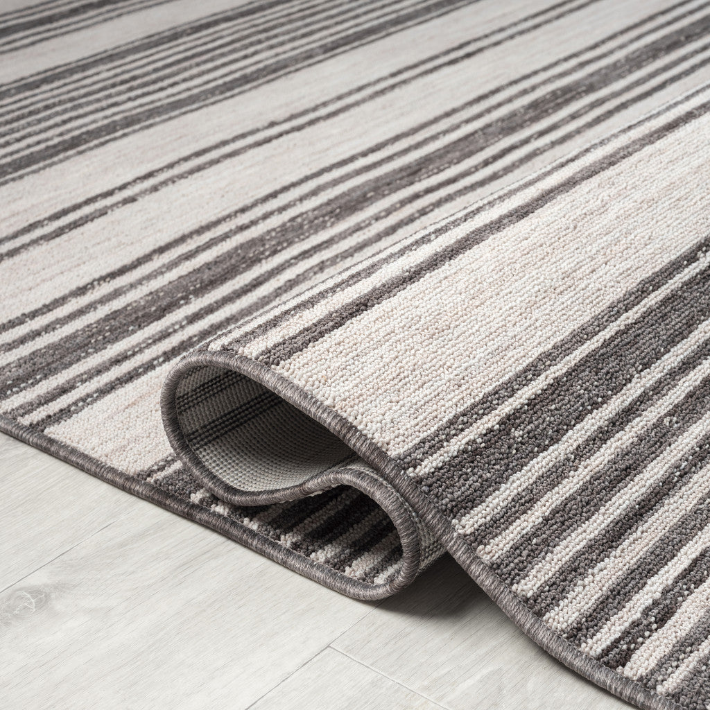 5' X 7' Gray And Ivory Striped Indoor Outdoor Area Rug