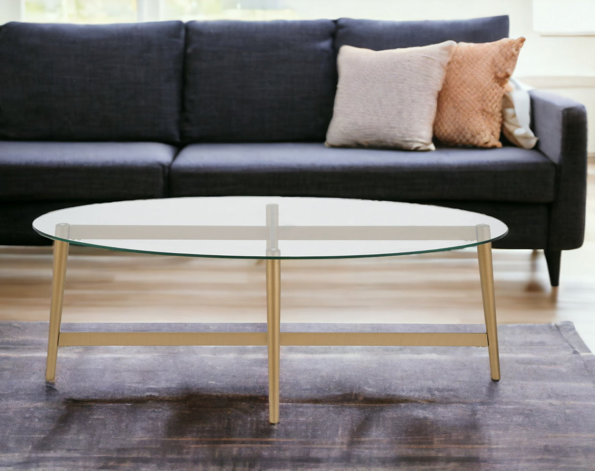50" Clear Glass And Gold Steel Oval Coffee Table