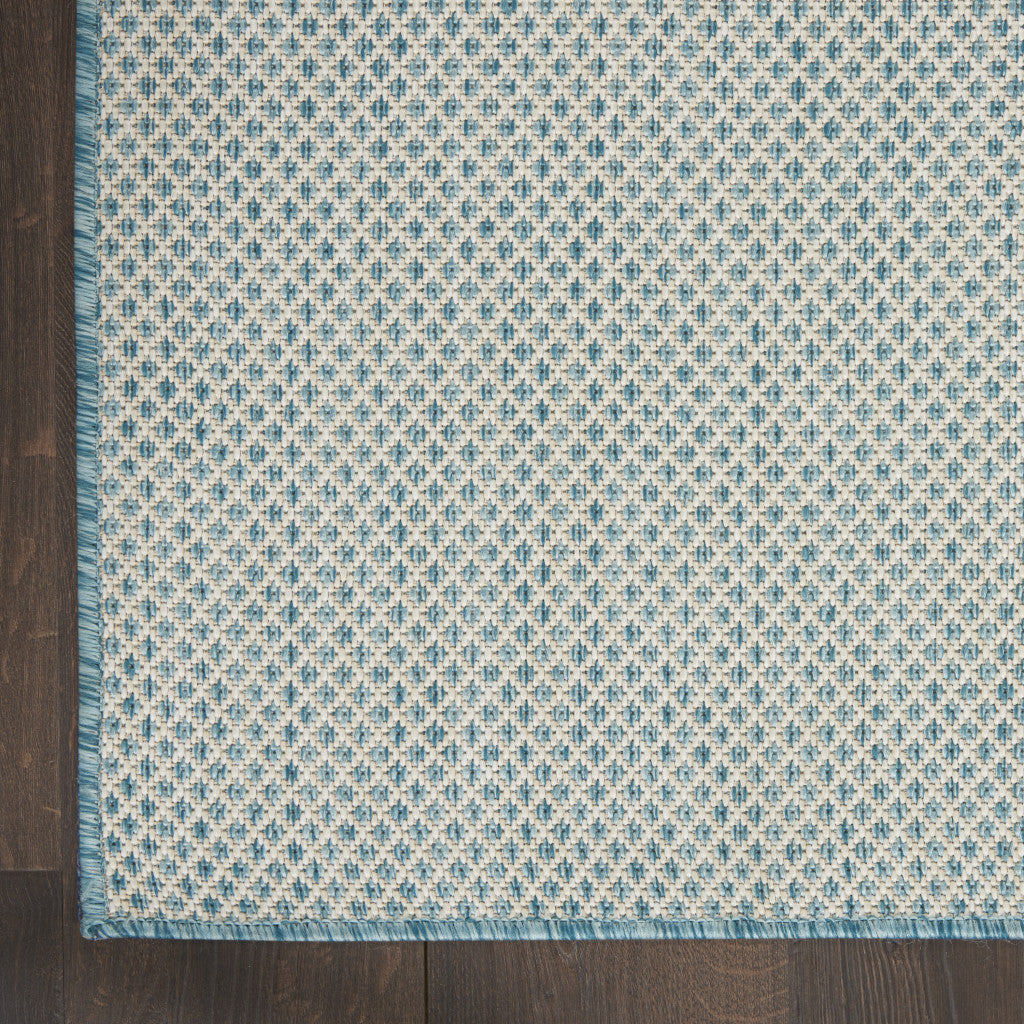 9' X 12' Aqua and Ivory Indoor Outdoor Area Rug