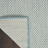 7' X 10' Aqua and Ivory Indoor Outdoor Area Rug