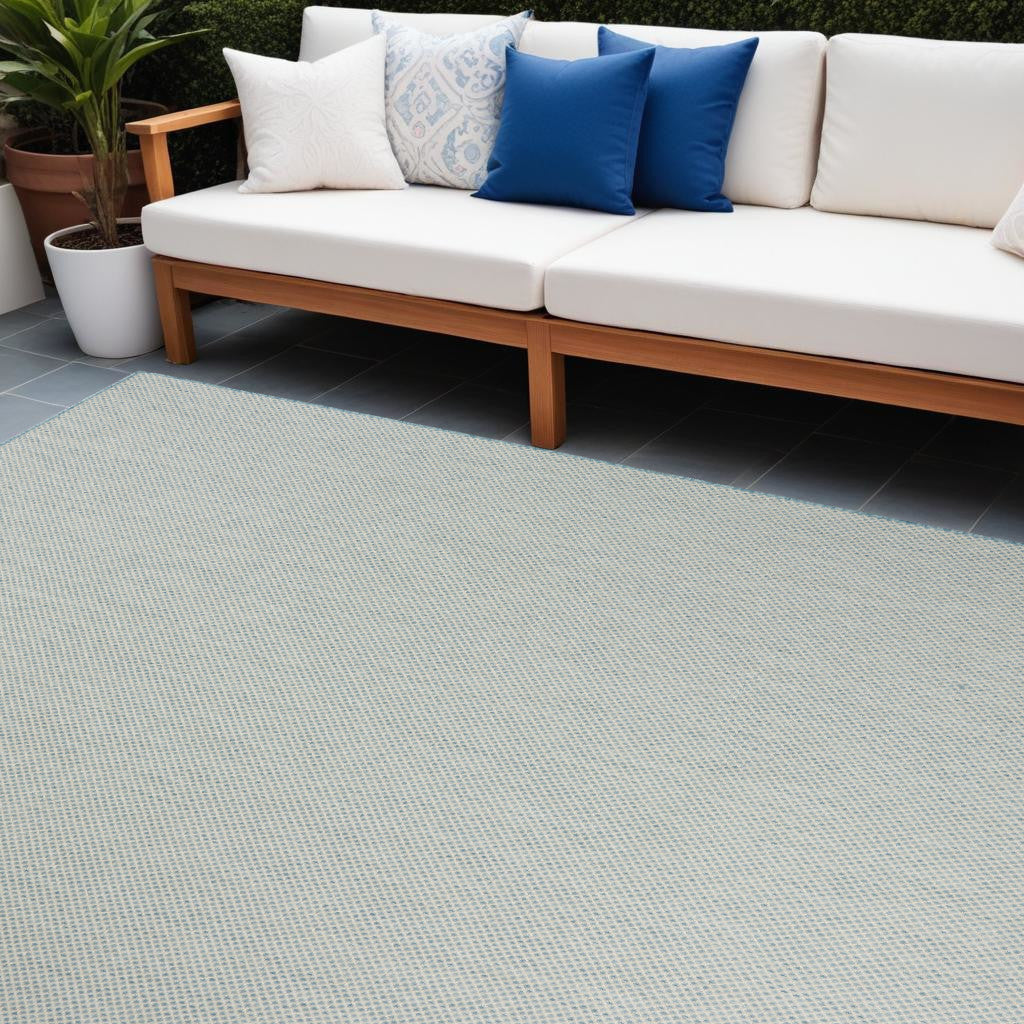 7' X 10' Aqua and Ivory Indoor Outdoor Area Rug