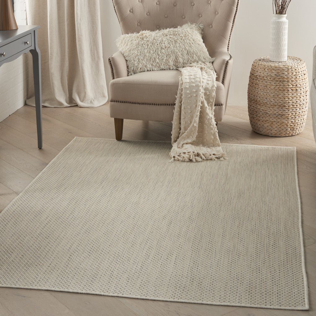 6' X 9' Ivory and Silver Indoor Outdoor Area Rug