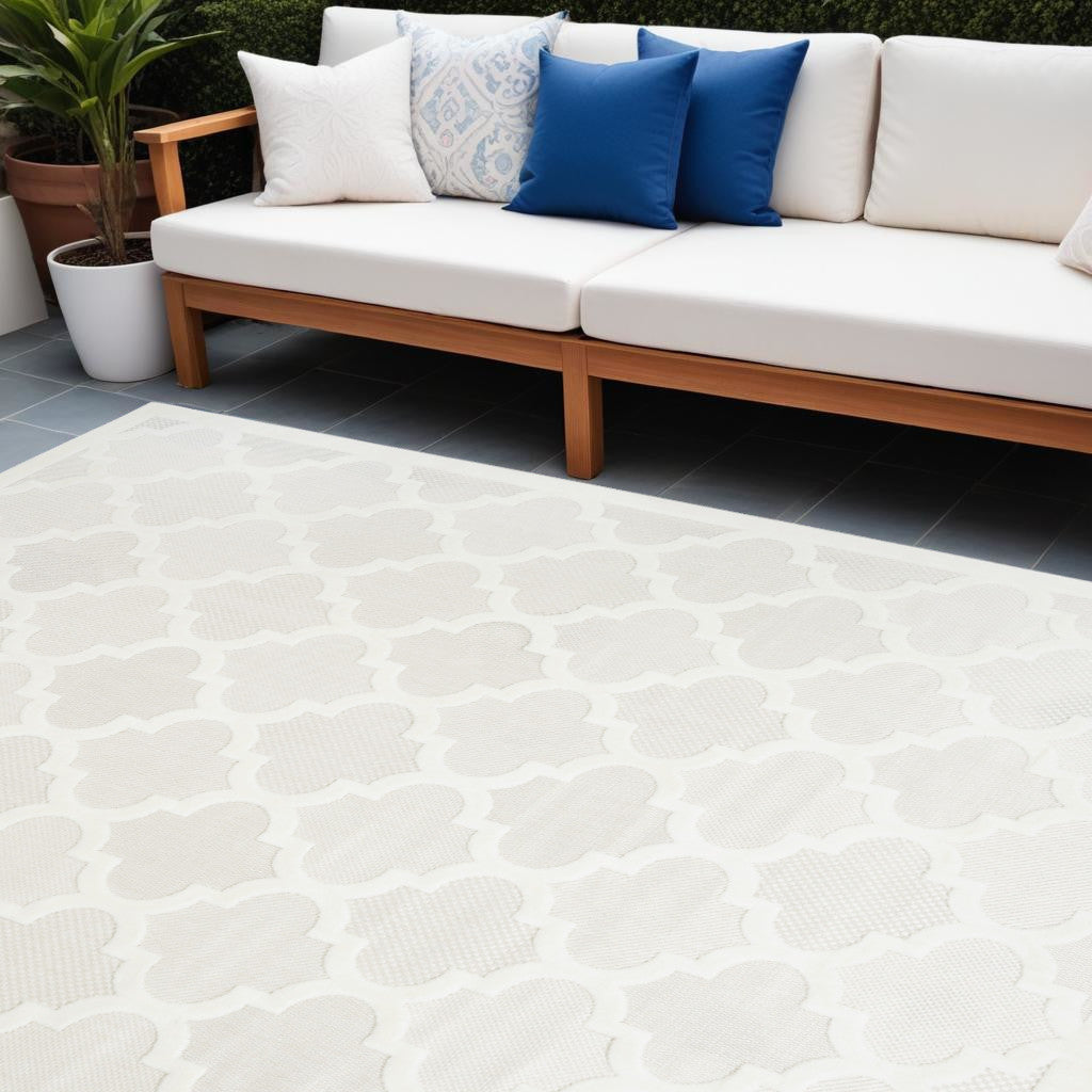 7' X 10' Ivory and White Indoor Outdoor Area Rug