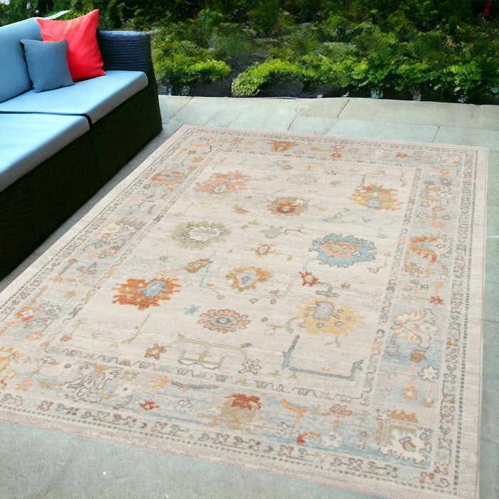 5' X 7' Gray and Orange Floral Stain Resistant Indoor Outdoor Area Rug