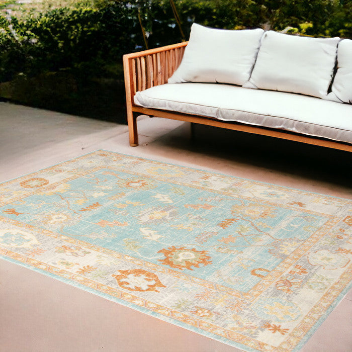 5' X 7' Blue and Orange Floral Stain Resistant Indoor Outdoor Area Rug