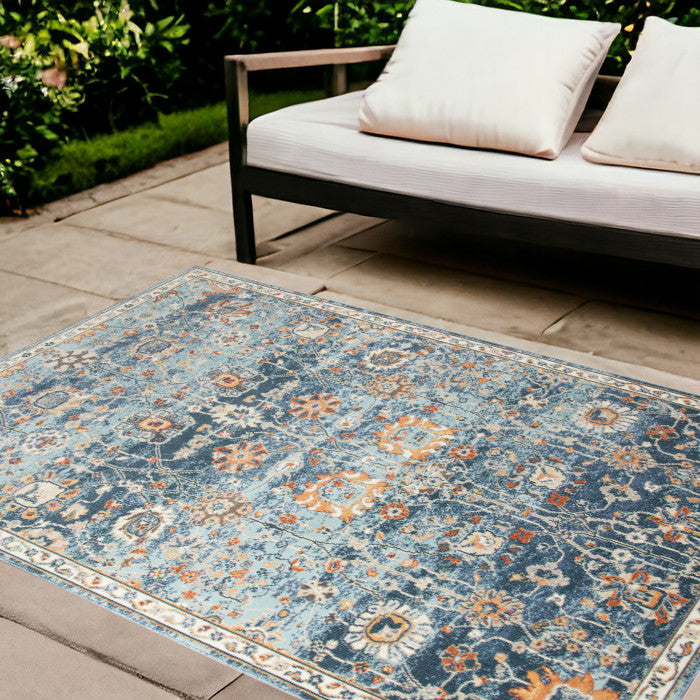 9' X 12' Blue and Orange Floral Stain Resistant Indoor Outdoor Area Rug