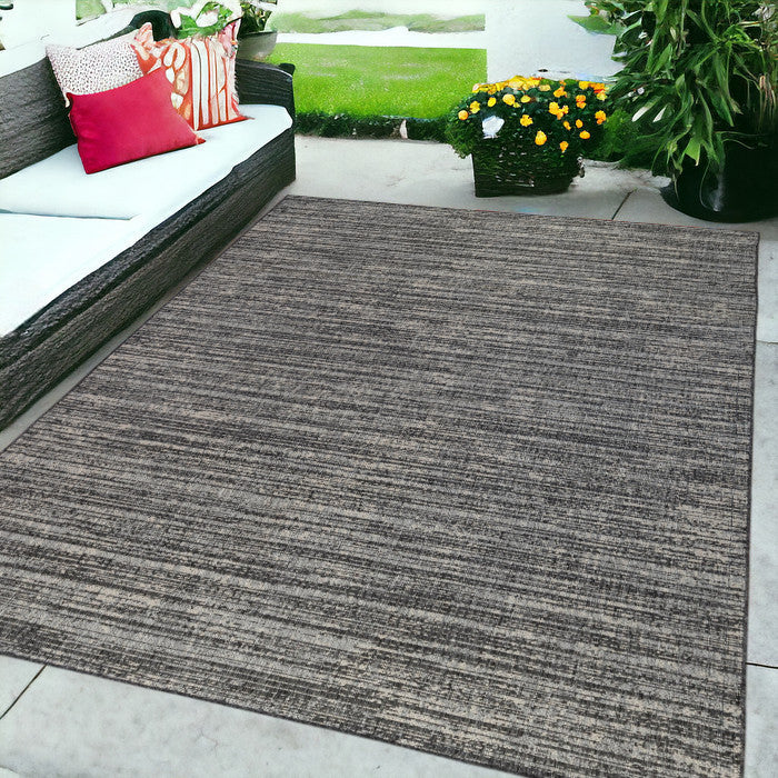 6' X 9' Brown and Ivory Striped Stain Resistant Indoor Outdoor Area Rug