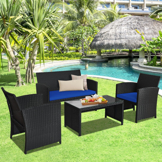 4 Pieces Rattan Patio Furniture Set with Weather Resistant Cushions and Tempered Glass Tabletop-Navy